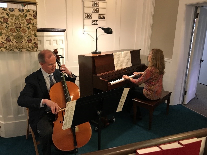 A cellist and pianist performing music